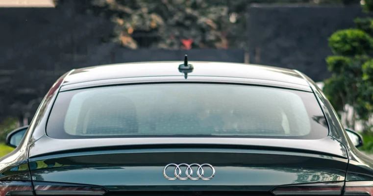 Rear view of an Audi with a clear rear windshield.